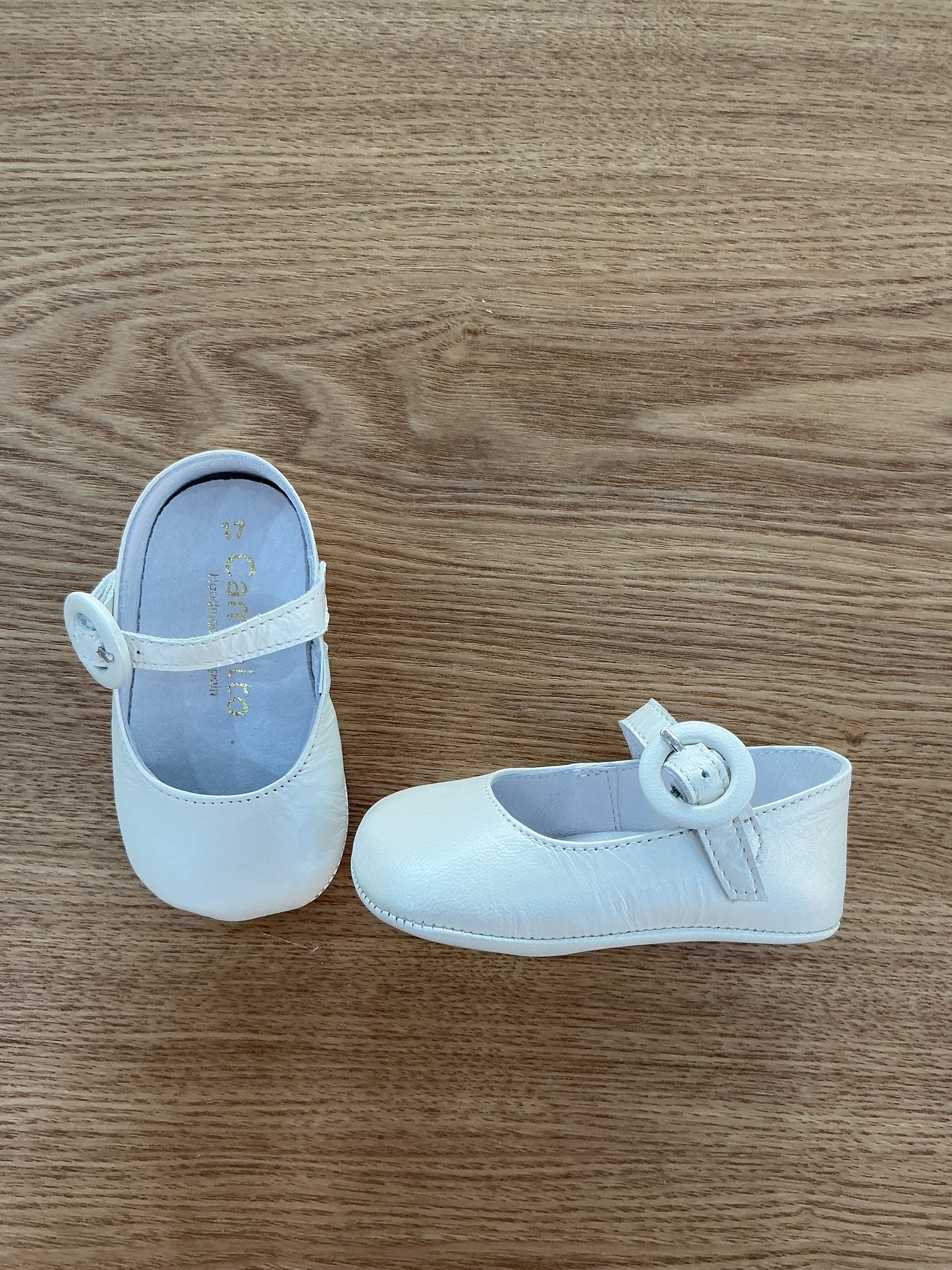 Ballerina culla oblò pelle perlata