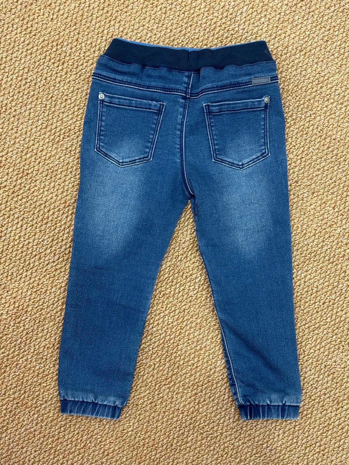 Jeans con molla