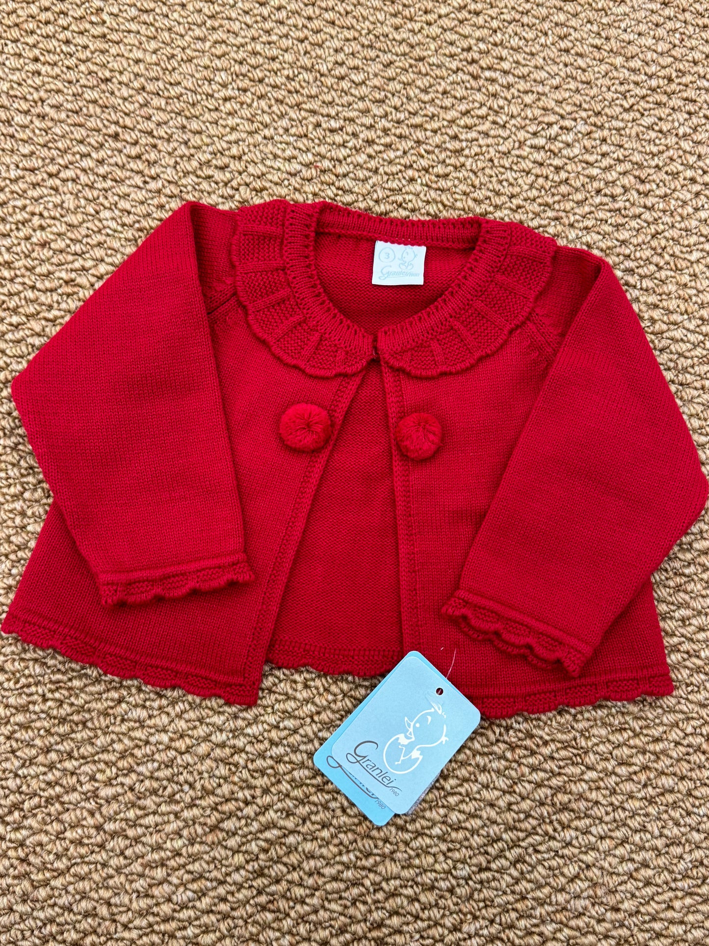 Cardigan ponpon unisex