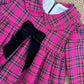 Abito tartan fuxia