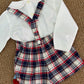 Salopette con camicia ponpon