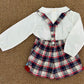 Salopette con camicia ponpon