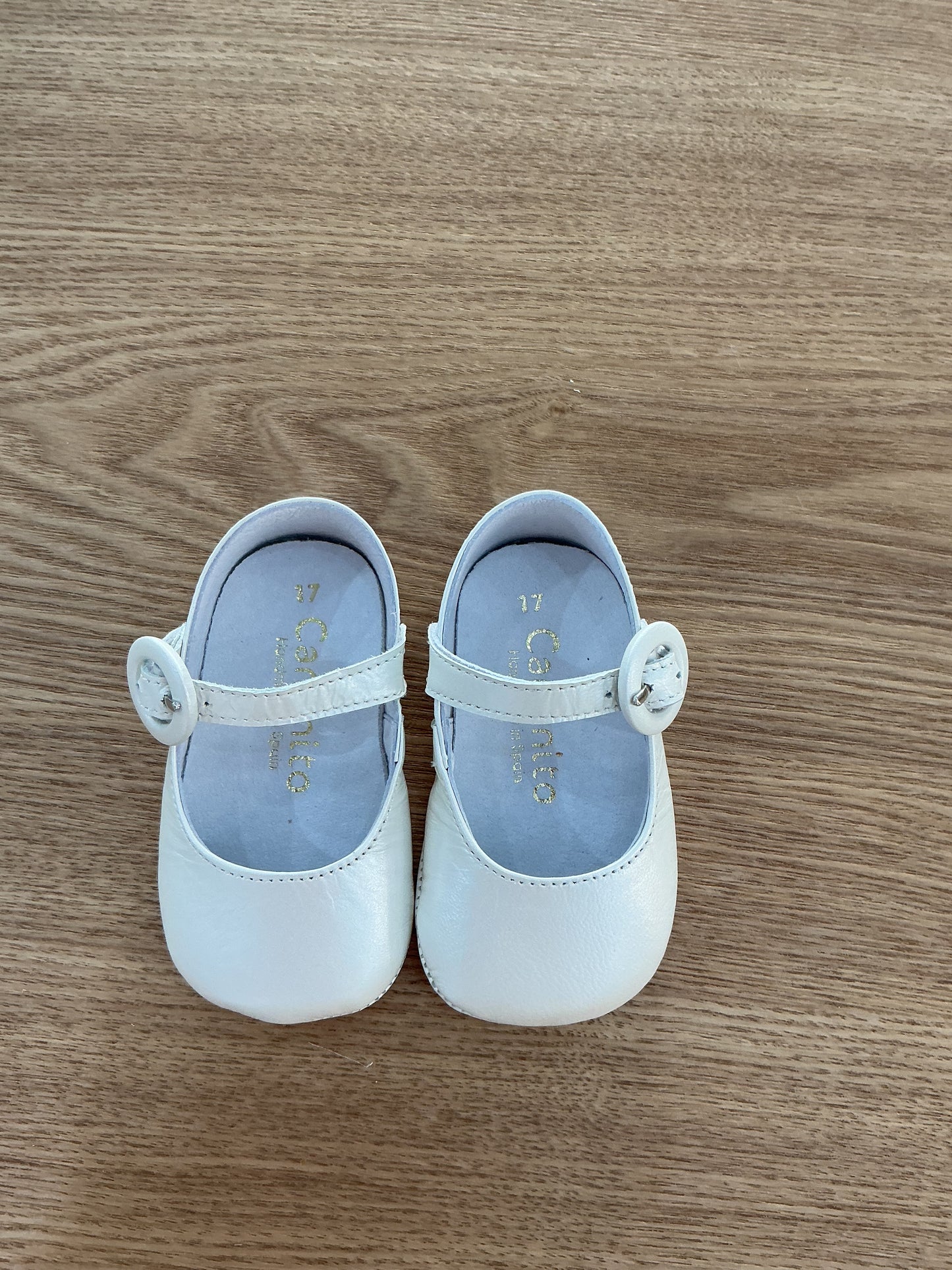 Ballerina culla oblò pelle perlata