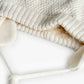 Cappello bianco con pompon