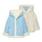 Cappottino neonato reversibile celeste bianco